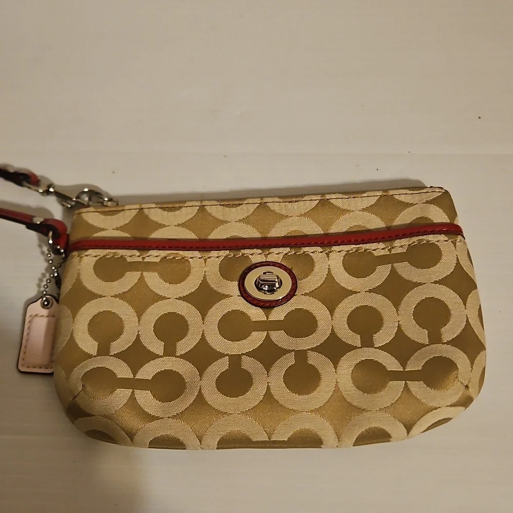 New Coach cream and pink wristlet